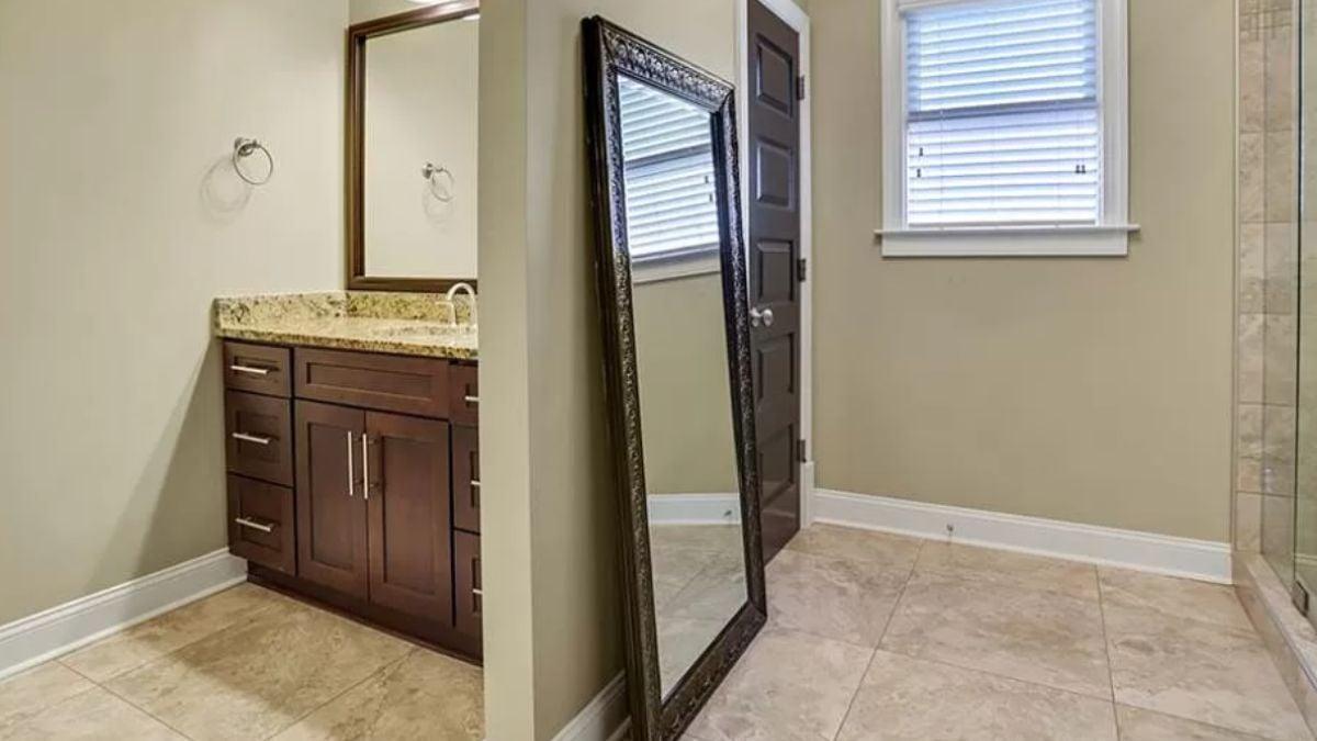 Check Out the Full-Length Mirror Adding Depth to This Bathroom