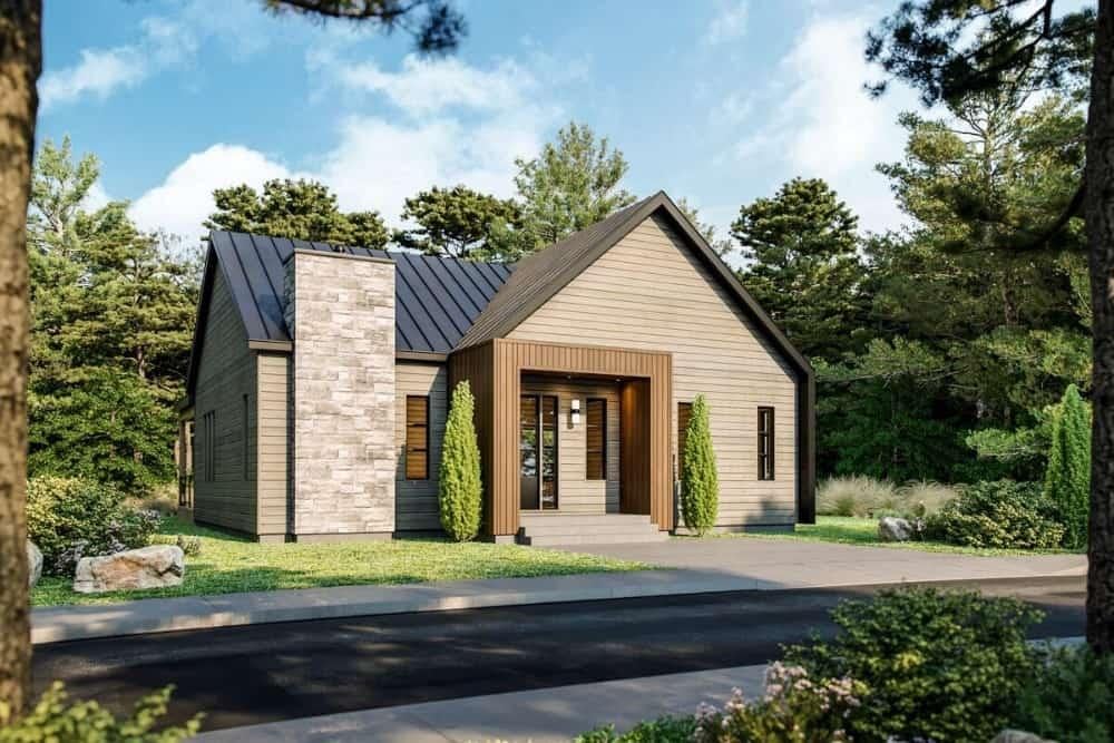 Modern Cottage with Striking Stone Chimney and Sleek Metal Roof
