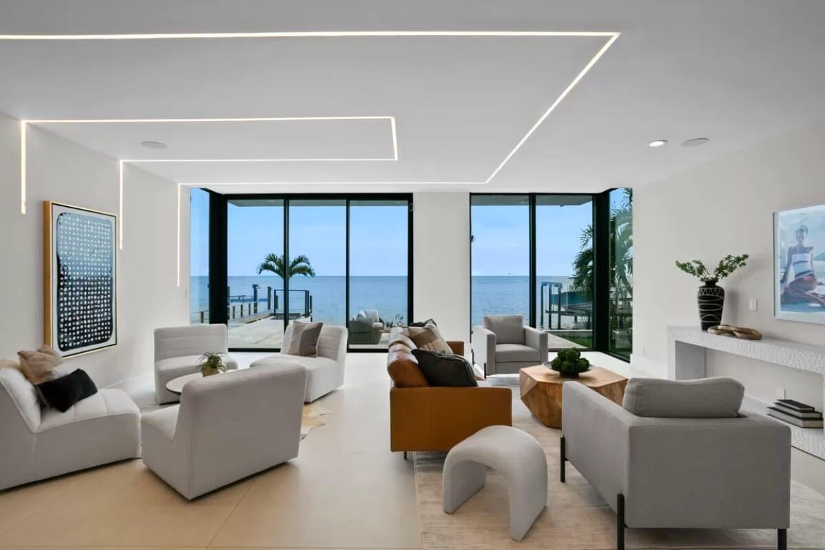 Living Room with a Mesmerizing Ocean View and Minimalist LED Ceiling Design
