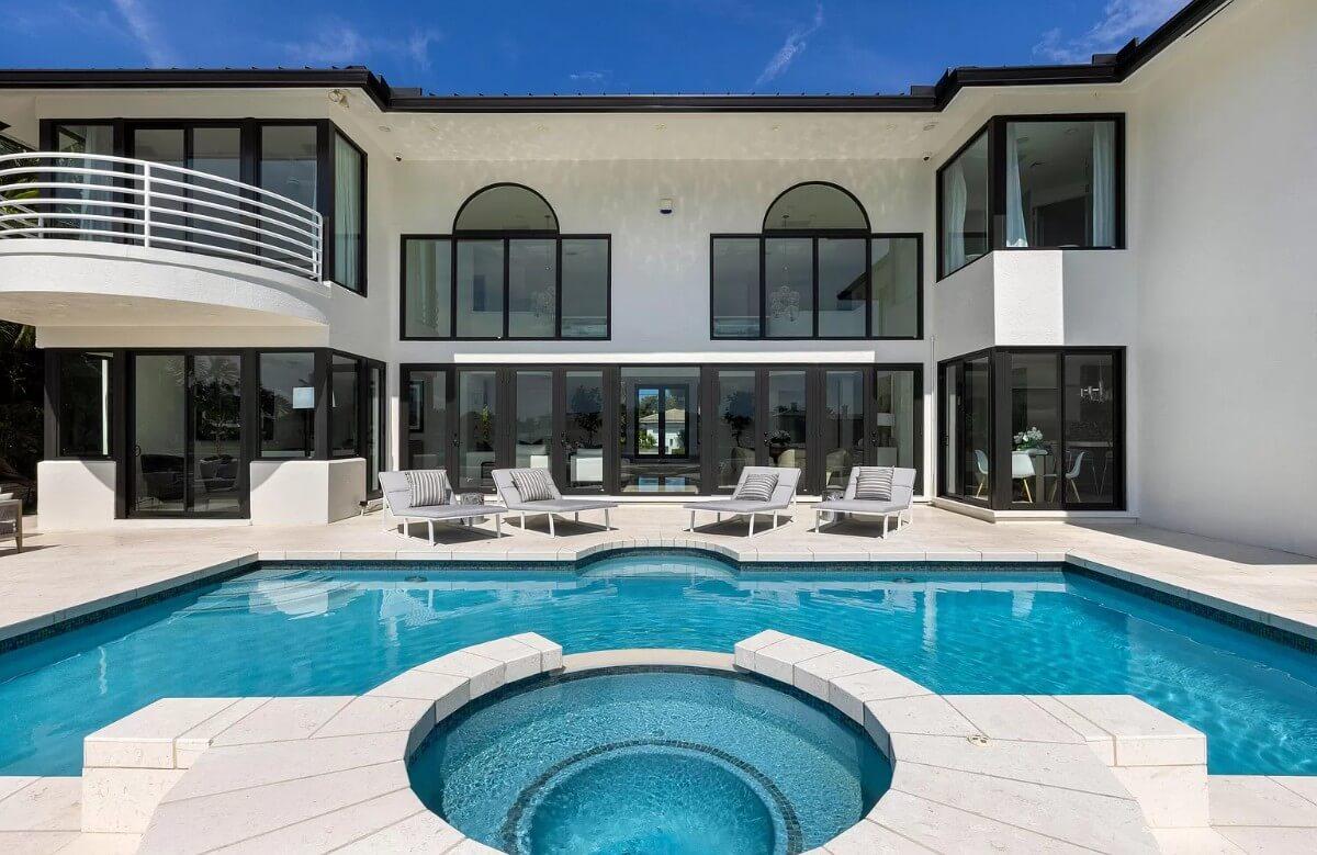 Notice the Sleek Balcony Overlooking This Modern Pool Area