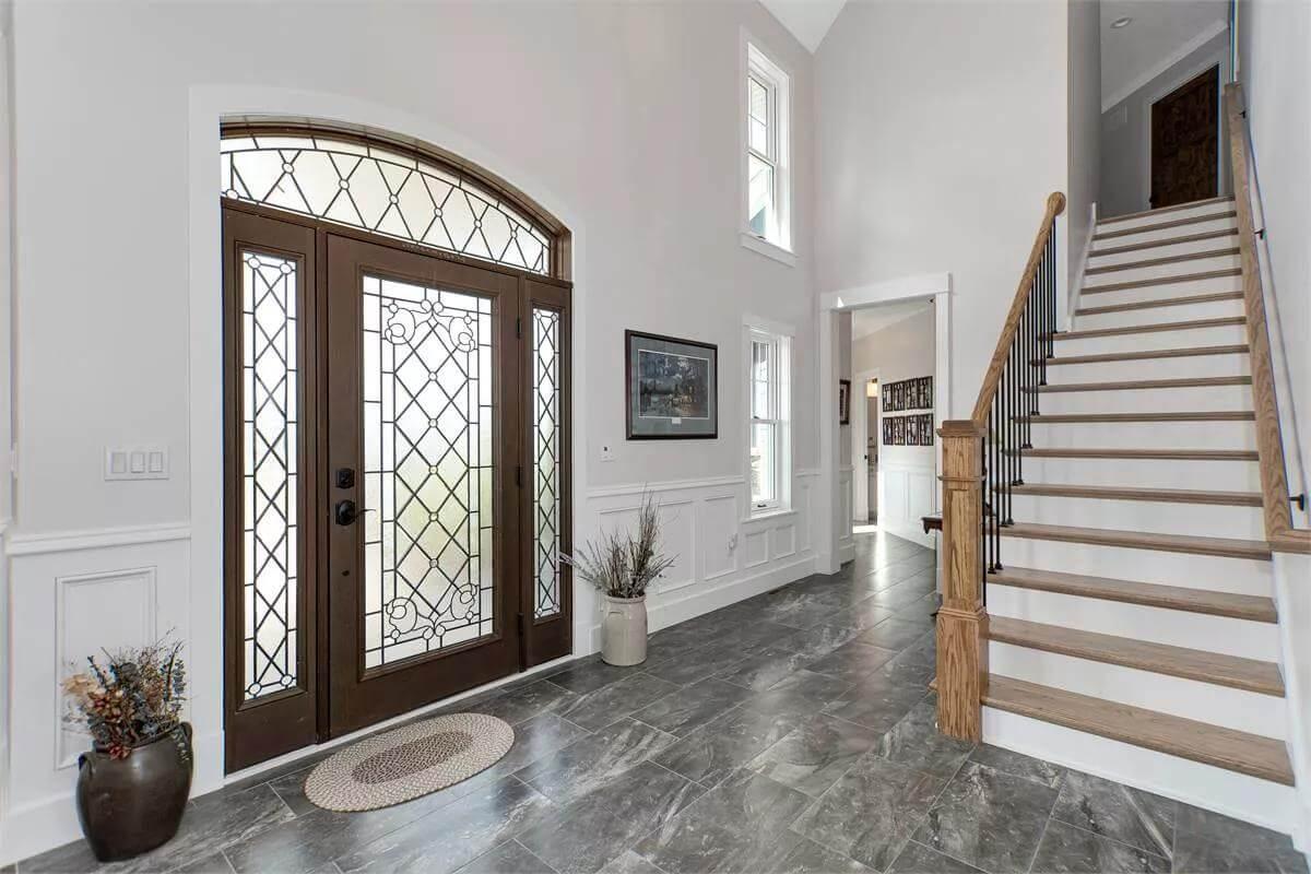 Check Out Those Elegant Glass Panels on the Entrance Door