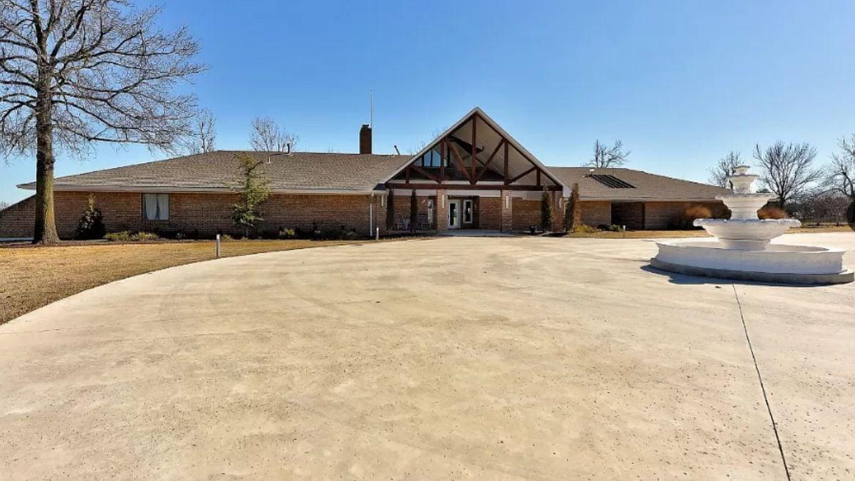 Take a Look at This Expansive Driveway Leading to an A-Frame Entrance