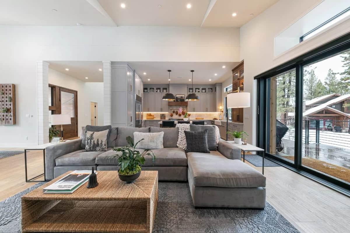 Notice How the Sleek Kitchen Opening Frames the Living Area Perfectly