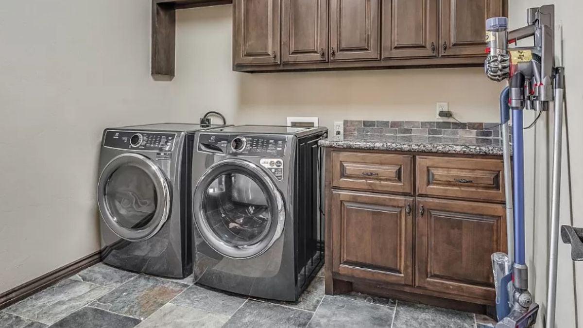 Laundry Room with Slate Flooring and Efficient Layout