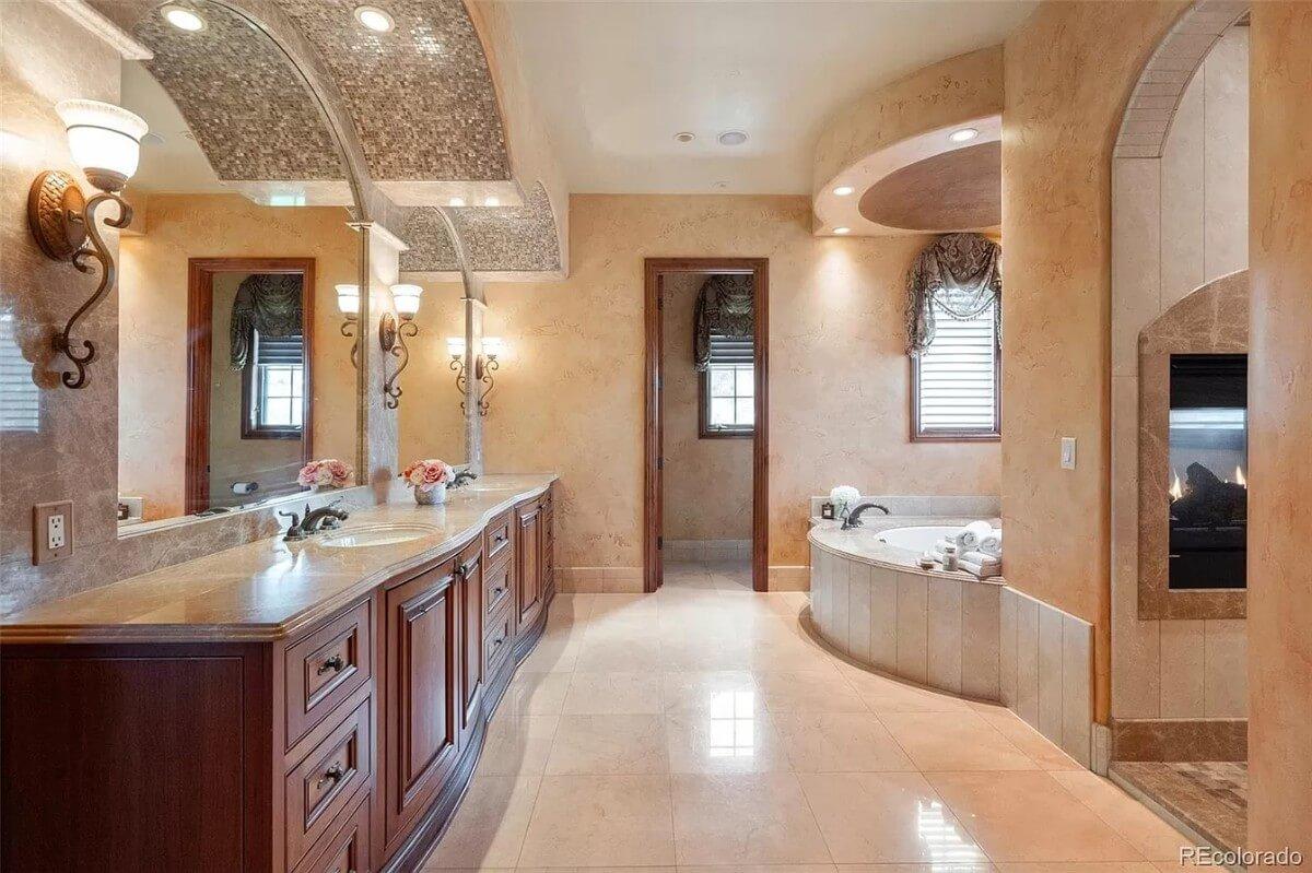 Notice the Elegant Inlaid Ceiling and Curved Vanity in This Lavish Bathroom
