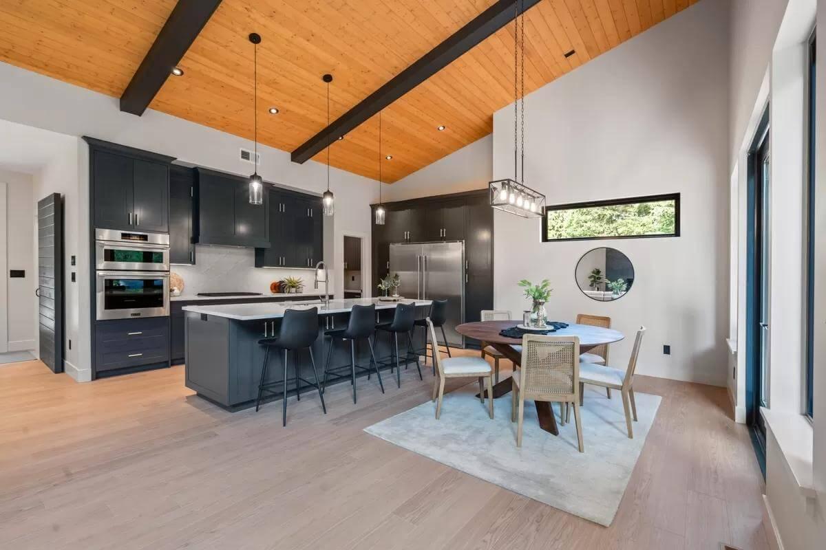 Notice the Bold Contrast in This Modern Kitchen and Dining Space