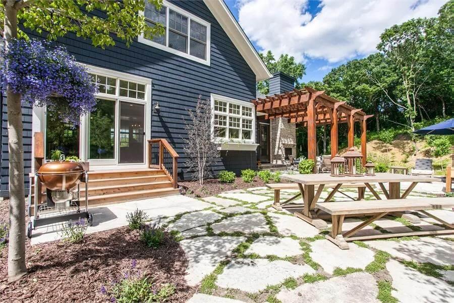 Craftsman Backyard with a Stunning Pergola and Patio Space