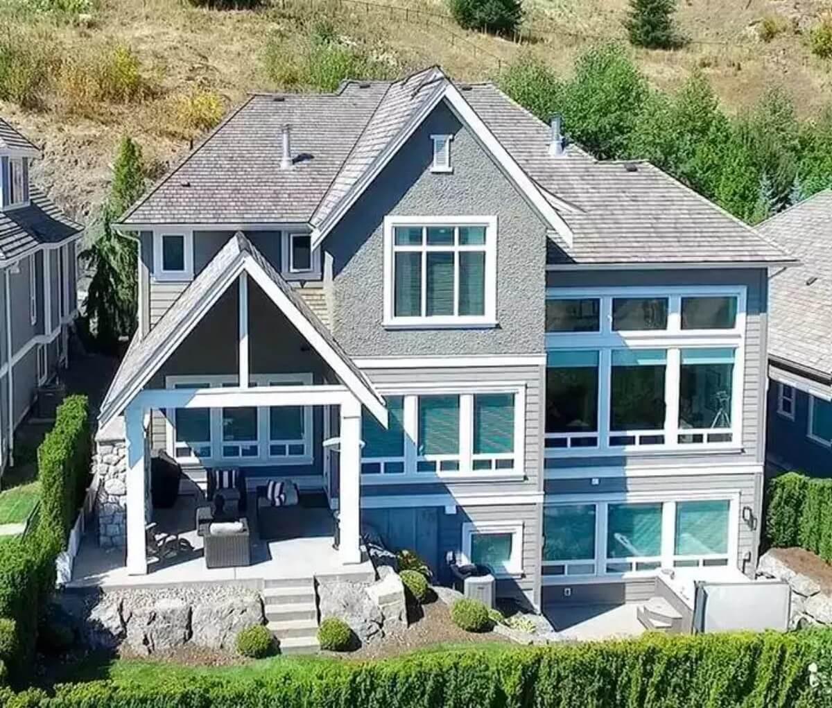 Covered Patio with a Gable Roof and Expansive Windows