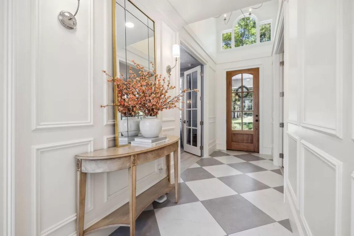 Notice the Classic Checkered Floor in This Inviting Entryway