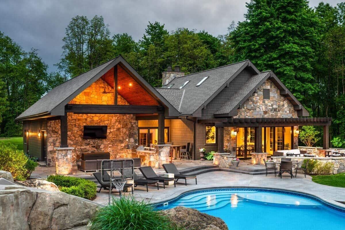 Wow, Check Out This Stone-Clad Retreat with a Poolside View