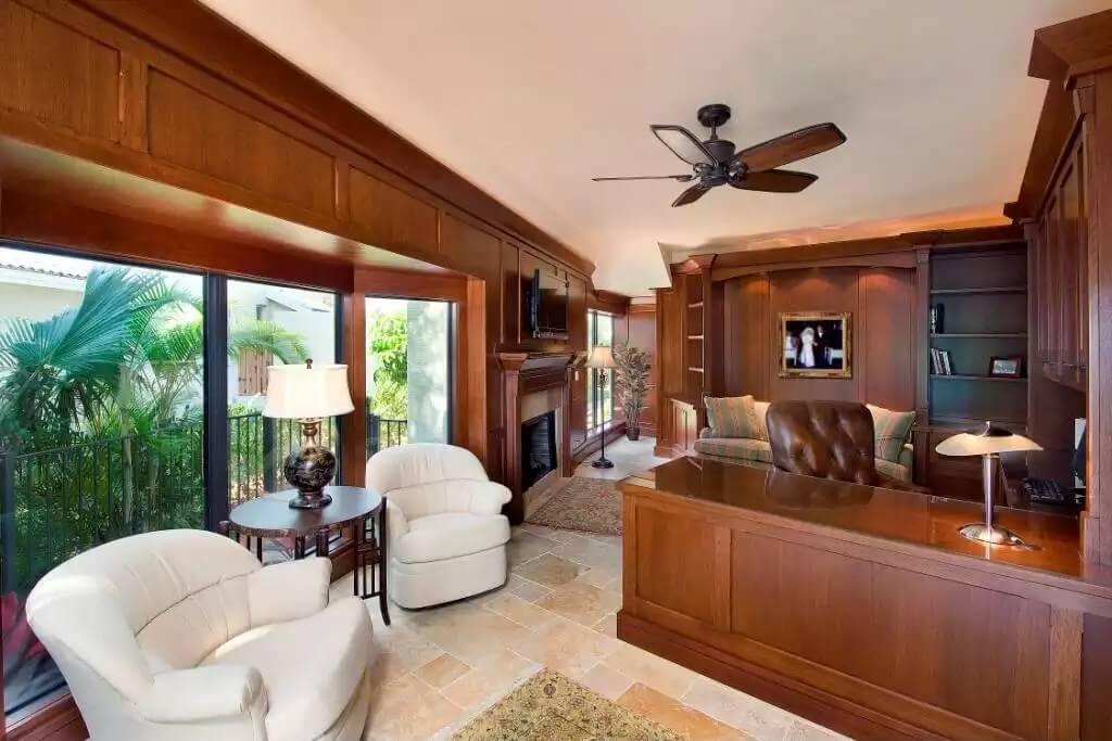 Step Into This Classic Study with Rich Wood Paneling