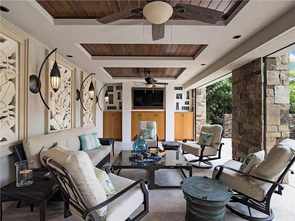 Cozy Outdoor Living Space with Intricate Wall Panels and Wood Accents