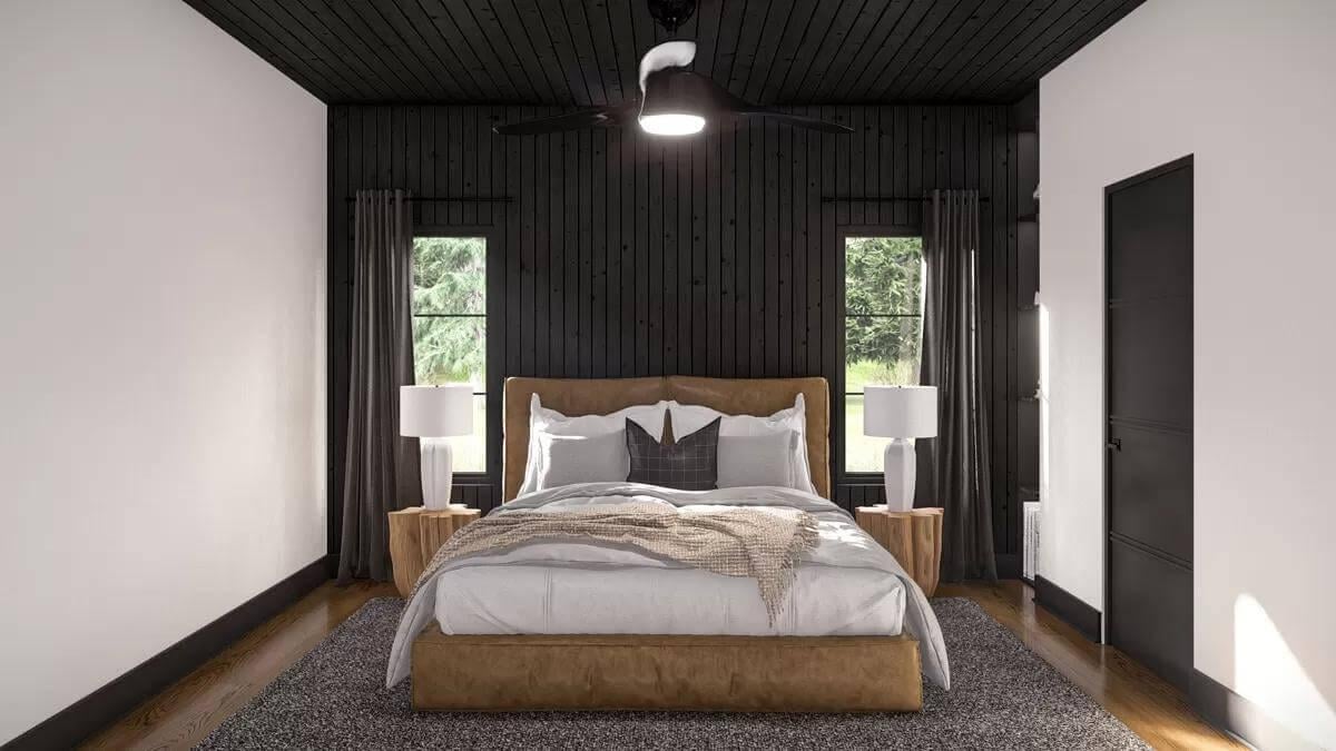 Moody Bedroom with a Bold Black Accent Wall