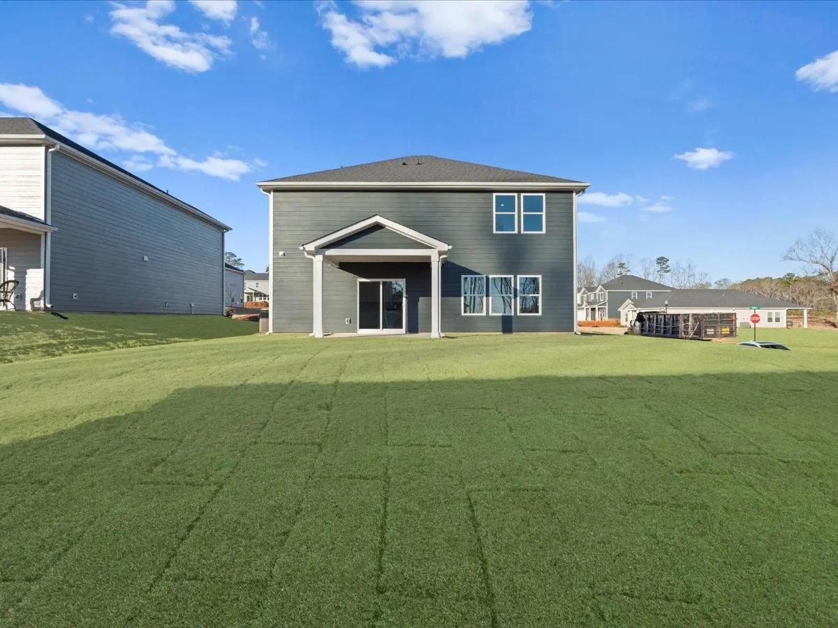 Craftsman-Style 4-Bedroom Home with Covered Patio and Two-Car Garage (2,345 Sq. Ft. Floor Plan)