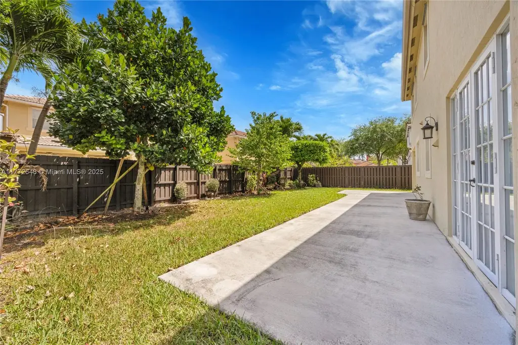 Mediterranean 4-Bedroom Revival-Style Home with Covered Patio and Two-Car Garage (2,747 Sq. Ft. Floor Plan)