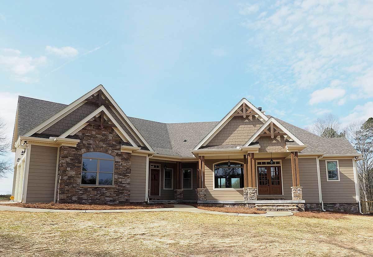 Rustic Charm with Stone Accents in This Inviting Facade