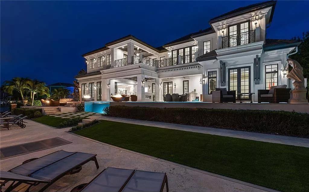 Elegant Facade Highlighted by Intricate Ironwork and Illuminated at Night
