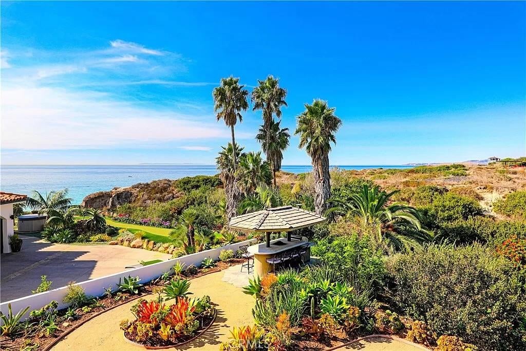 Embrace Coastal Bliss with This Outdoor Oasis and Ocean Panorama