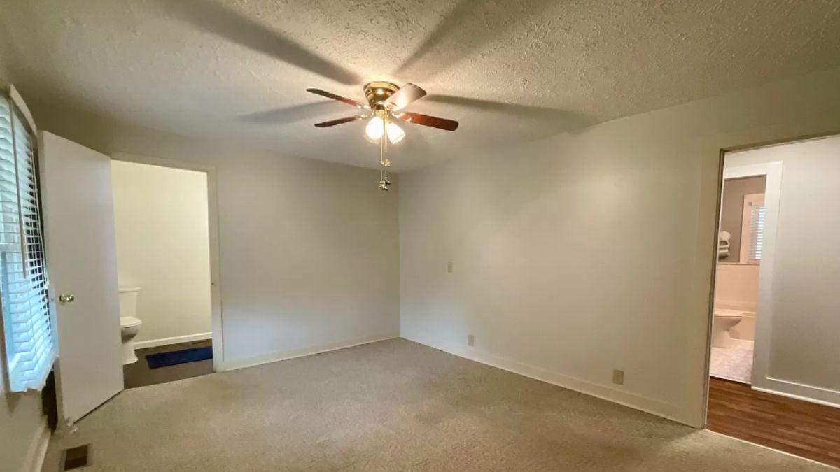 Simple Bedroom with a Classic Ceiling Fan
