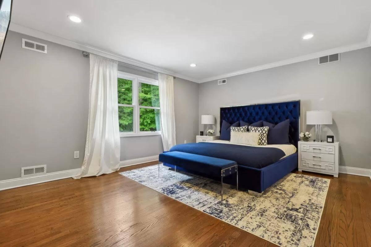 Sleek Bedroom with a Striking Velvet Headboard
