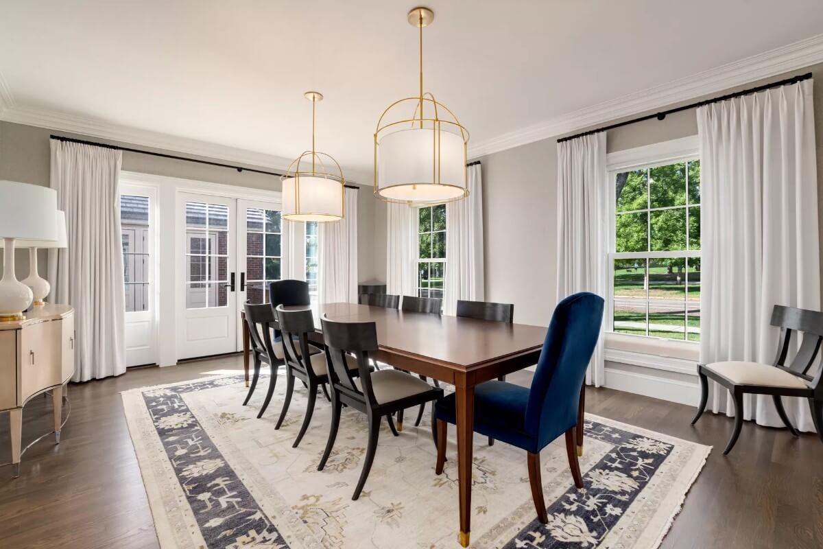 Elegant Dining Room Highlighting Gold Pendant Light Fixtures