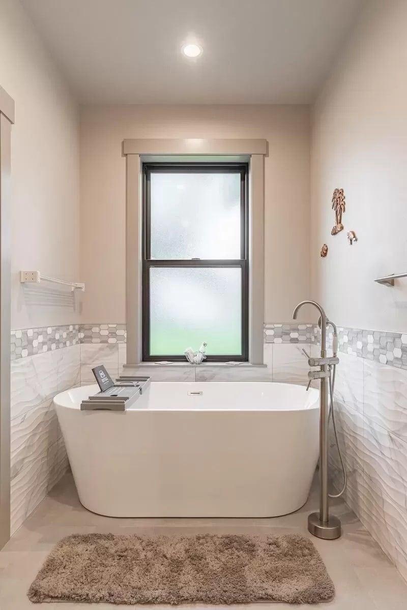 Freestanding Bathtub with Elegant Tile Detailing