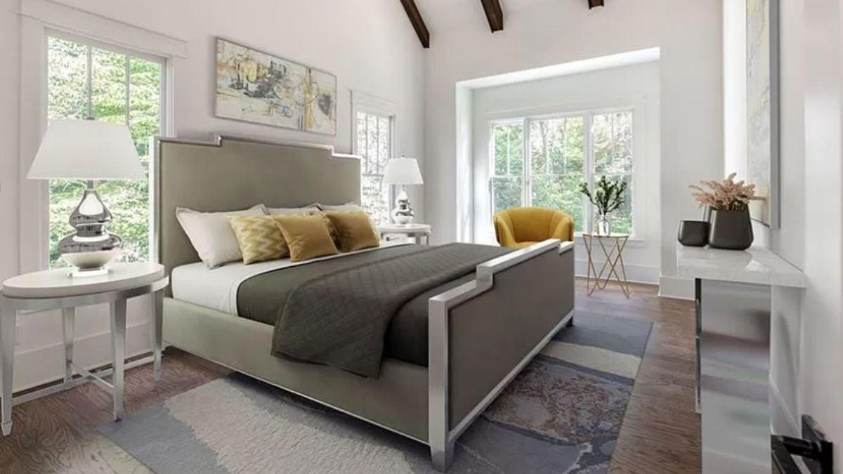 Bright Bedroom Featuring a Stylish Grey Bed and Vaulted Ceiling
