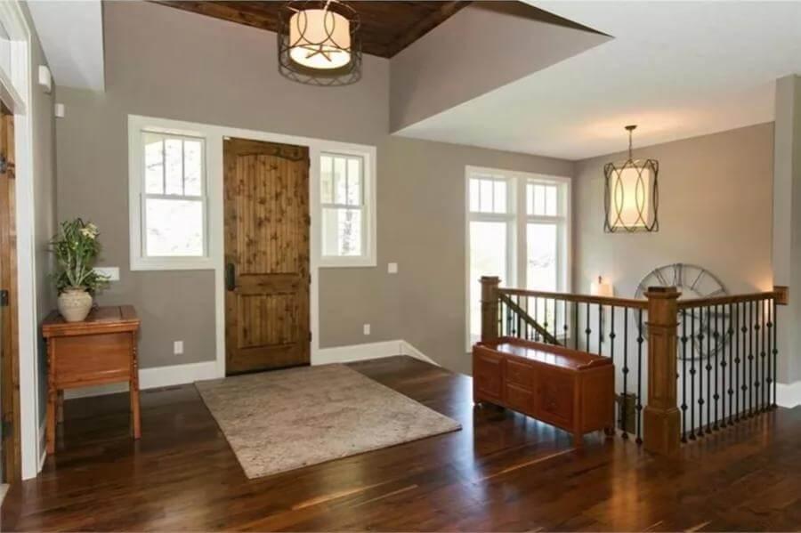 Warm Entryway Highlighted by Rustic Wooden Accents