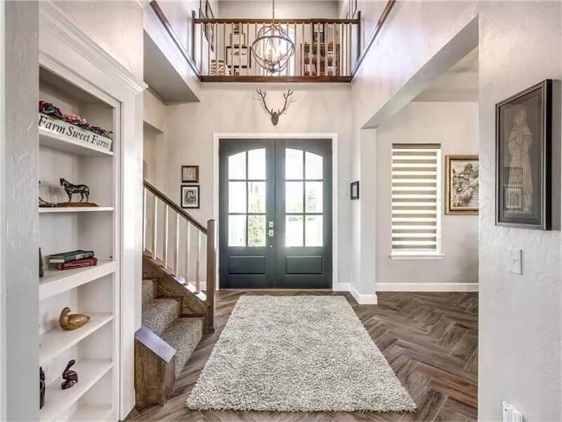 Step Inside: Grand Entryway with Double Doors and Farmhouse Charm