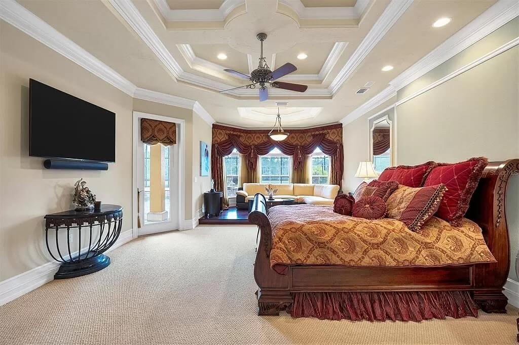 Notice the Luxurious Tray Ceiling in This Elegant Bedroom Retreat