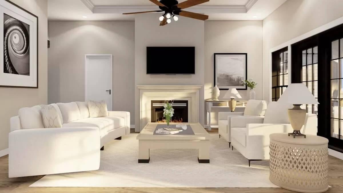 Living Room with Centerpiece Fireplace and Elegant White Sofas