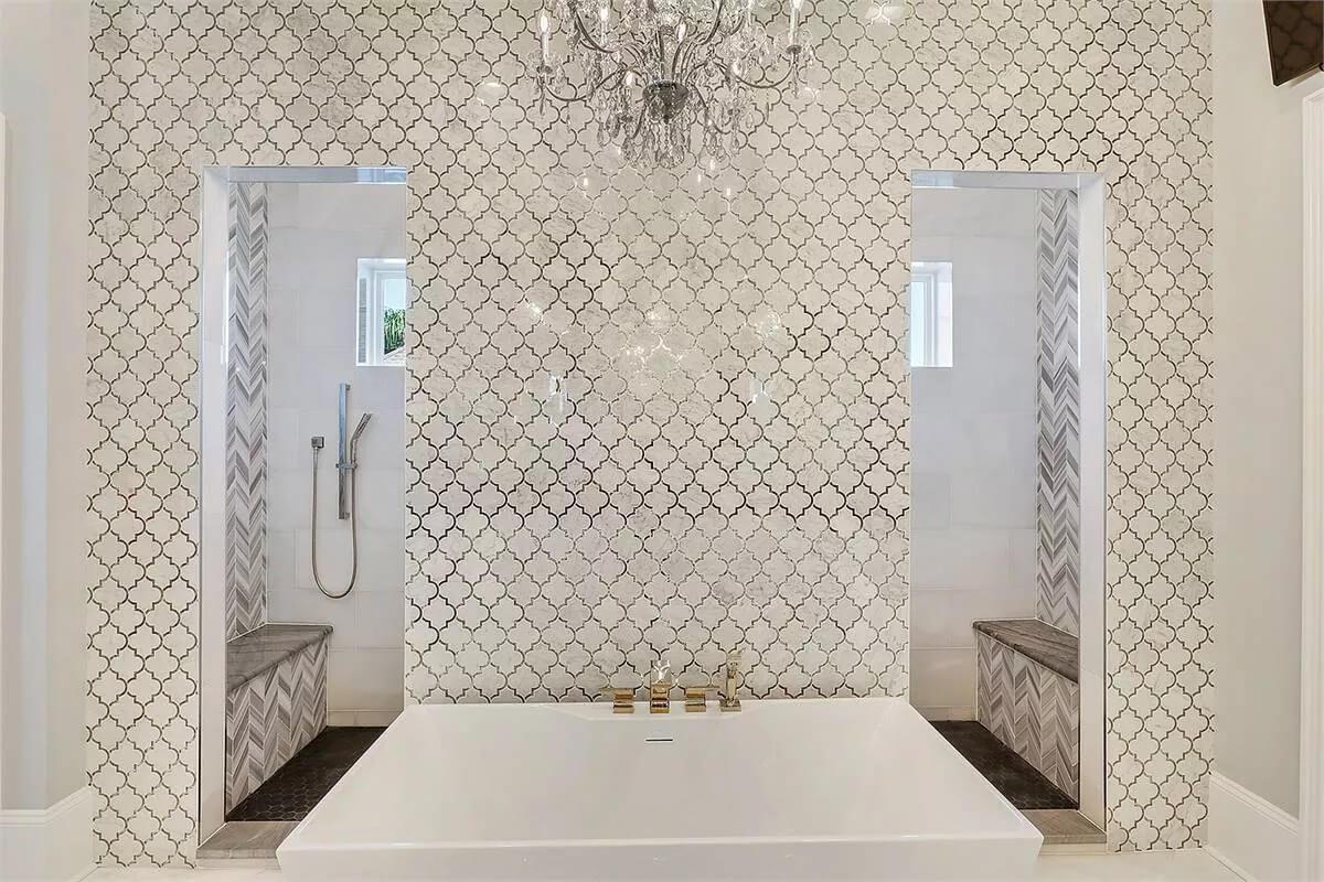 Check Out the Luxurious Bath Framed by a Beautiful Tiled Wall