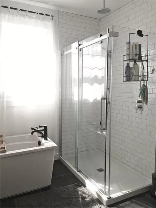 Minimalist Bathroom Design Featuring a Sleek Glass Shower