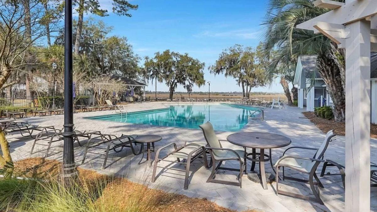 Relax by the Pool with Views of Expansive Marshland
