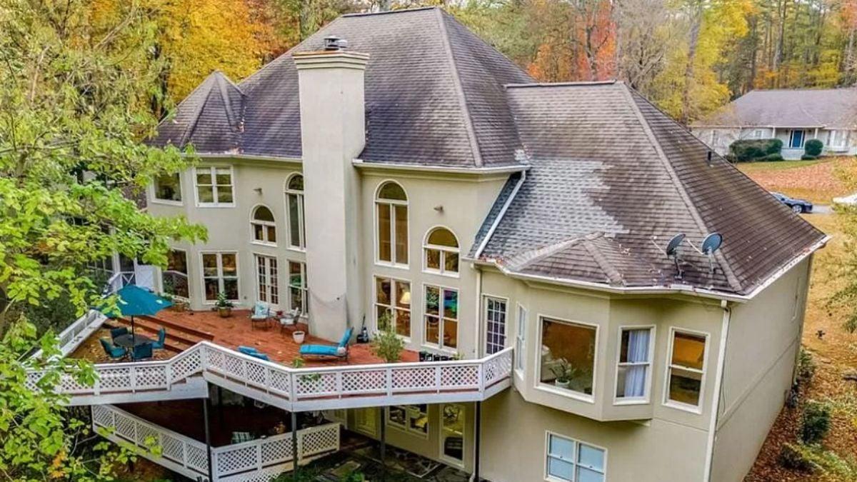 Stunning Backyard with Multi-Level Deck Overlooking Lush Woodland