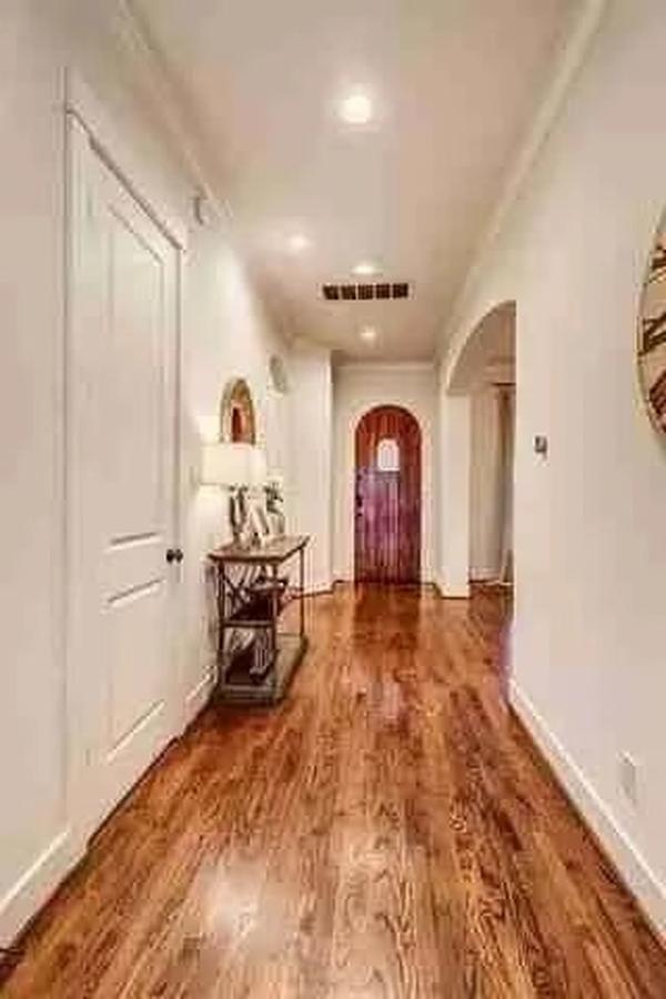 Check Out the Rich Wood Flooring in This Inviting Hallway