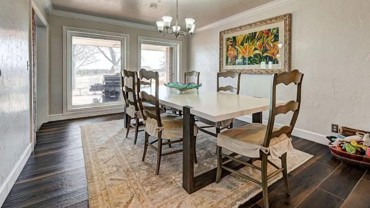 Check Out the Rustic Dining Chairs Paired with a Sleek White Table