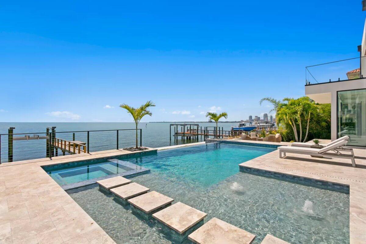 Check Out This Infinity Pool with Integrated Hot Tub and Ocean Views