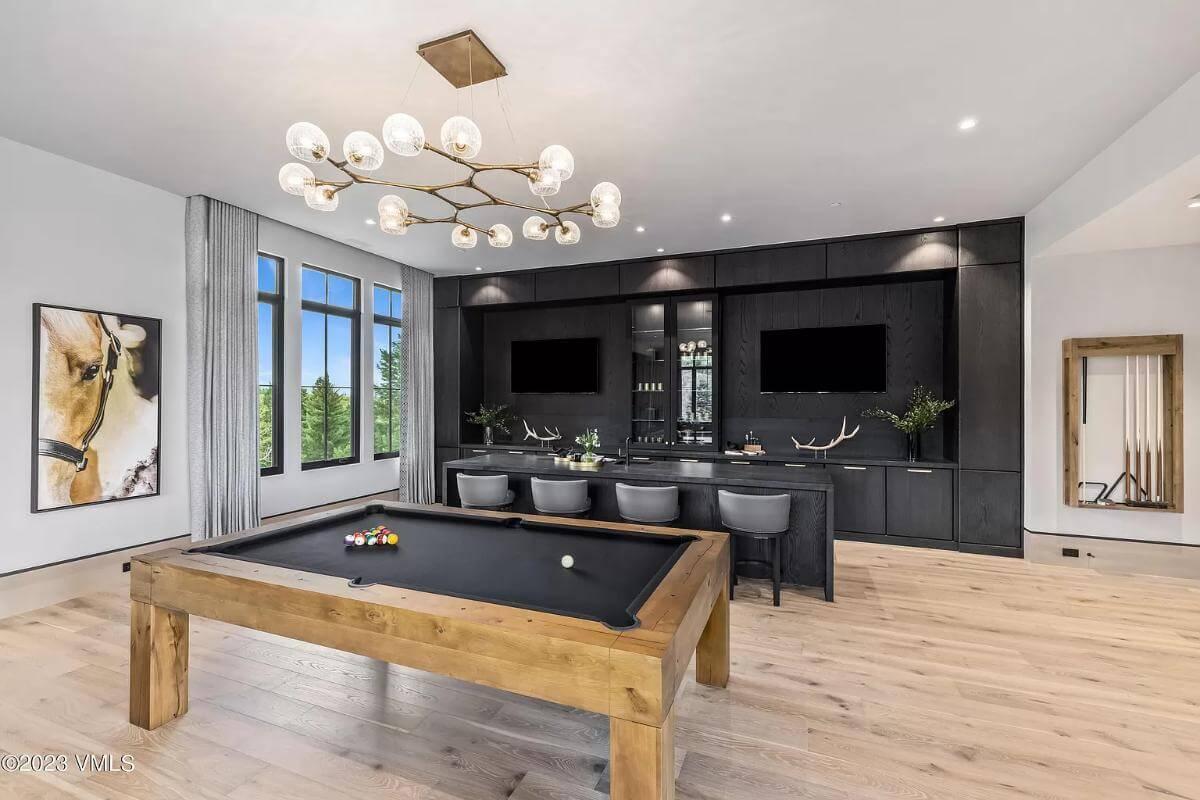 Wow, Check Out That Sleek Bar in This Stylish Game Room