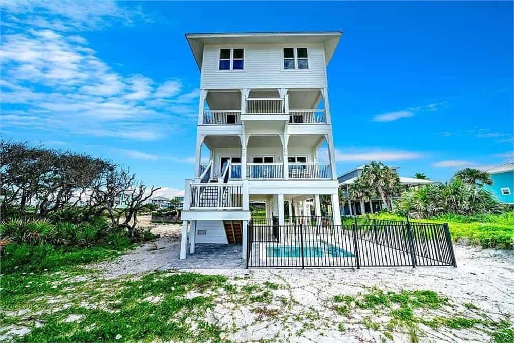Wow, Check Out This Towering Coastal Retreat with Multiple Decks
