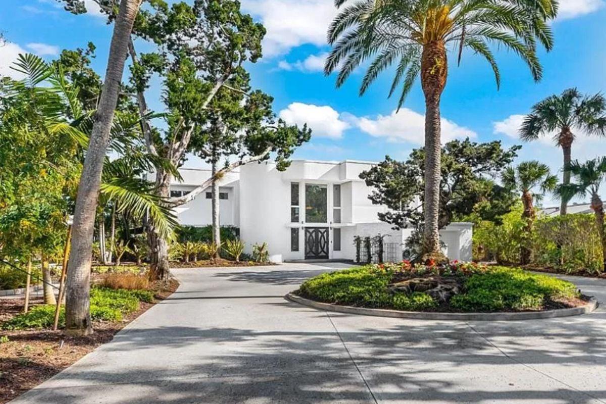 Marvel at the Modern Facade Framed by Tropical Foliage