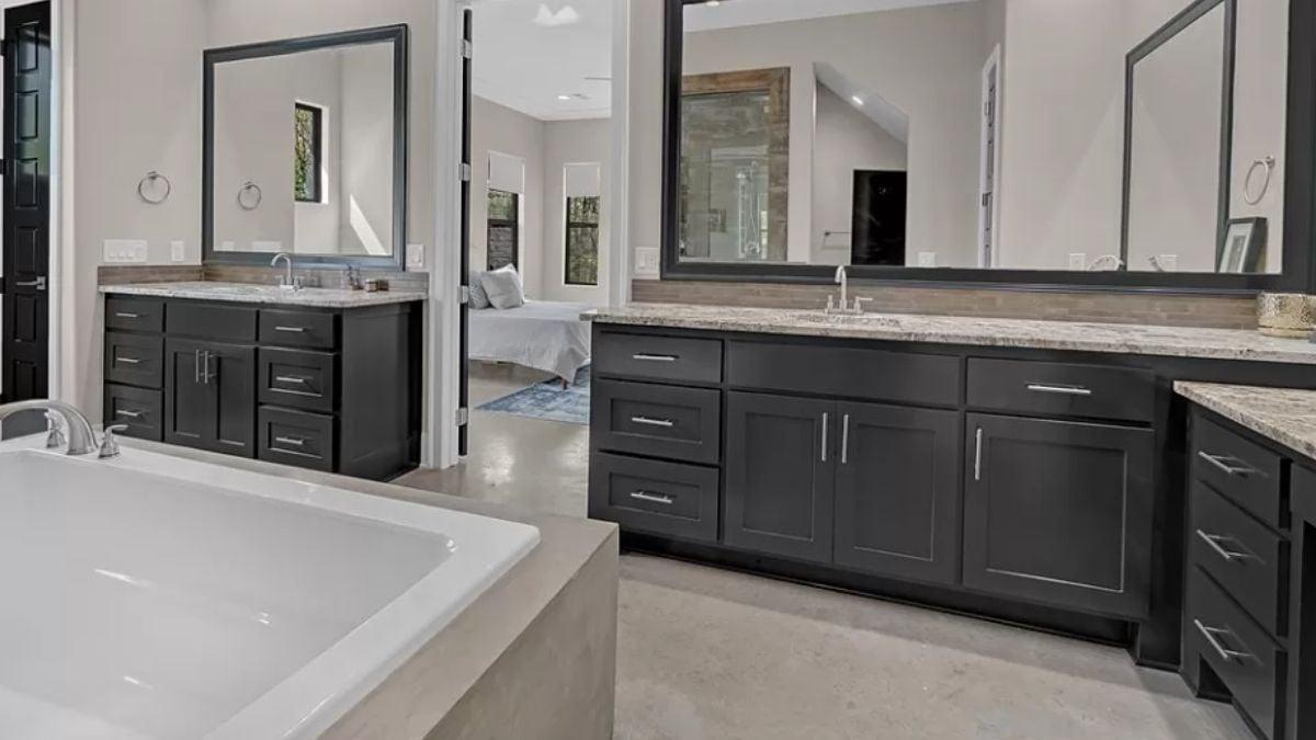 Dual Vanities and a Luxurious Soaking Tub in This Modern Bathroom