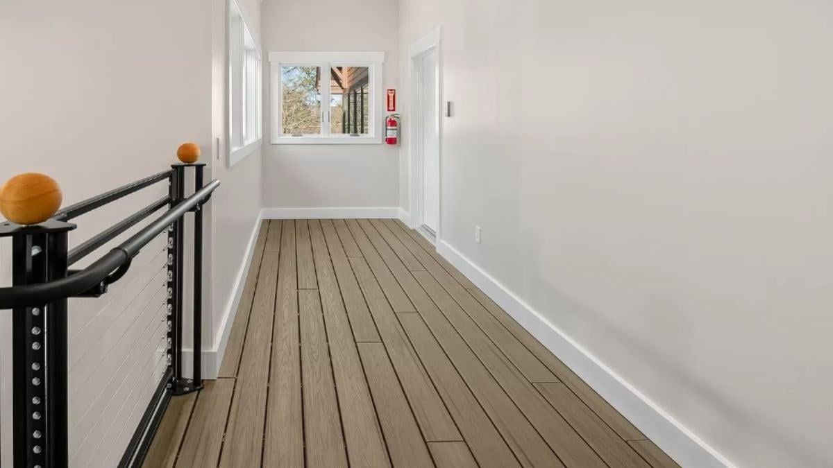 Notice the Sleek Industrial Railing Along This Hallway