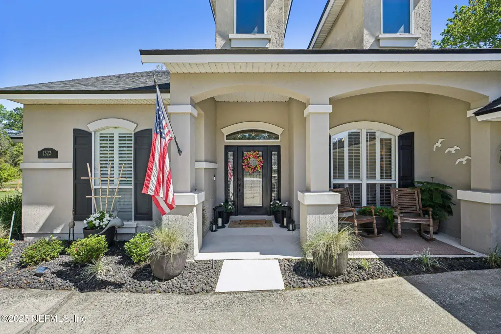 3-Bedroom French Country-Style Home with Front Porch and 2-Car Angled Garage (2,210 Sq. Ft. Floor Plan)