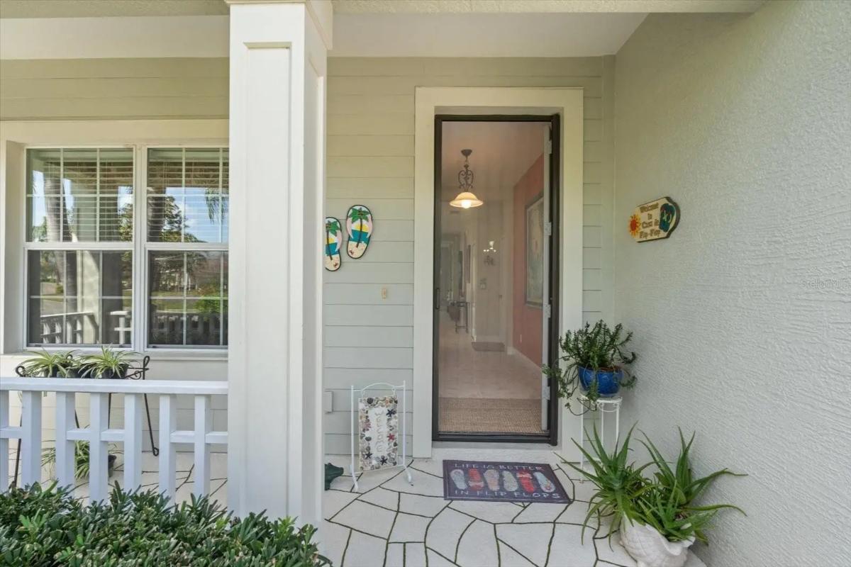 Contemporary 3-Bedroom Florida Home with Front Porch and Screened-in Pool (1,805 Sq. Ft. Floor Plan)