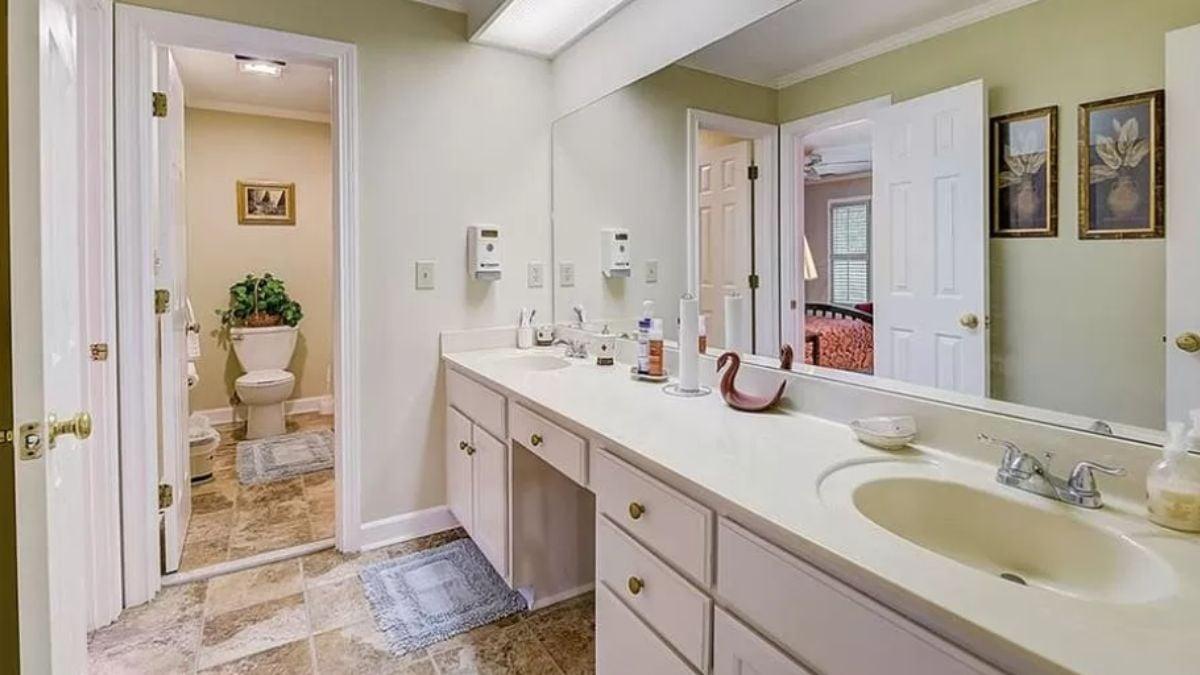 Look at the Long Double Vanity in This Classic Bathroom