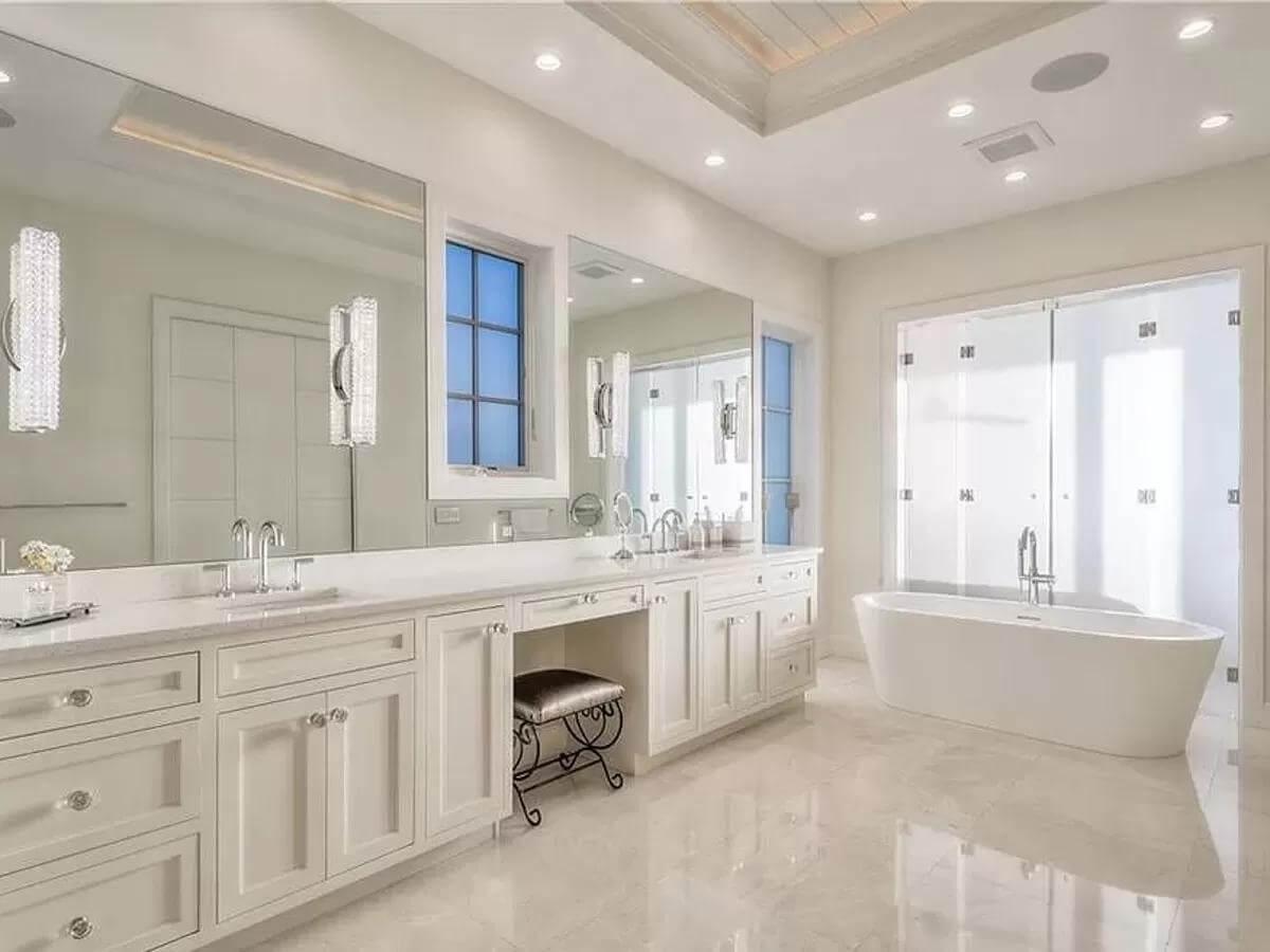 Wow, Notice the Freestanding Tub and Elegant Crystal Lighting in This Bathroom