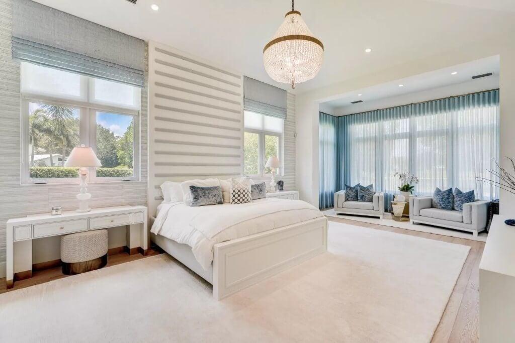 Notice the Dramatic Chandelier Elevating This Elegant Master Bedroom