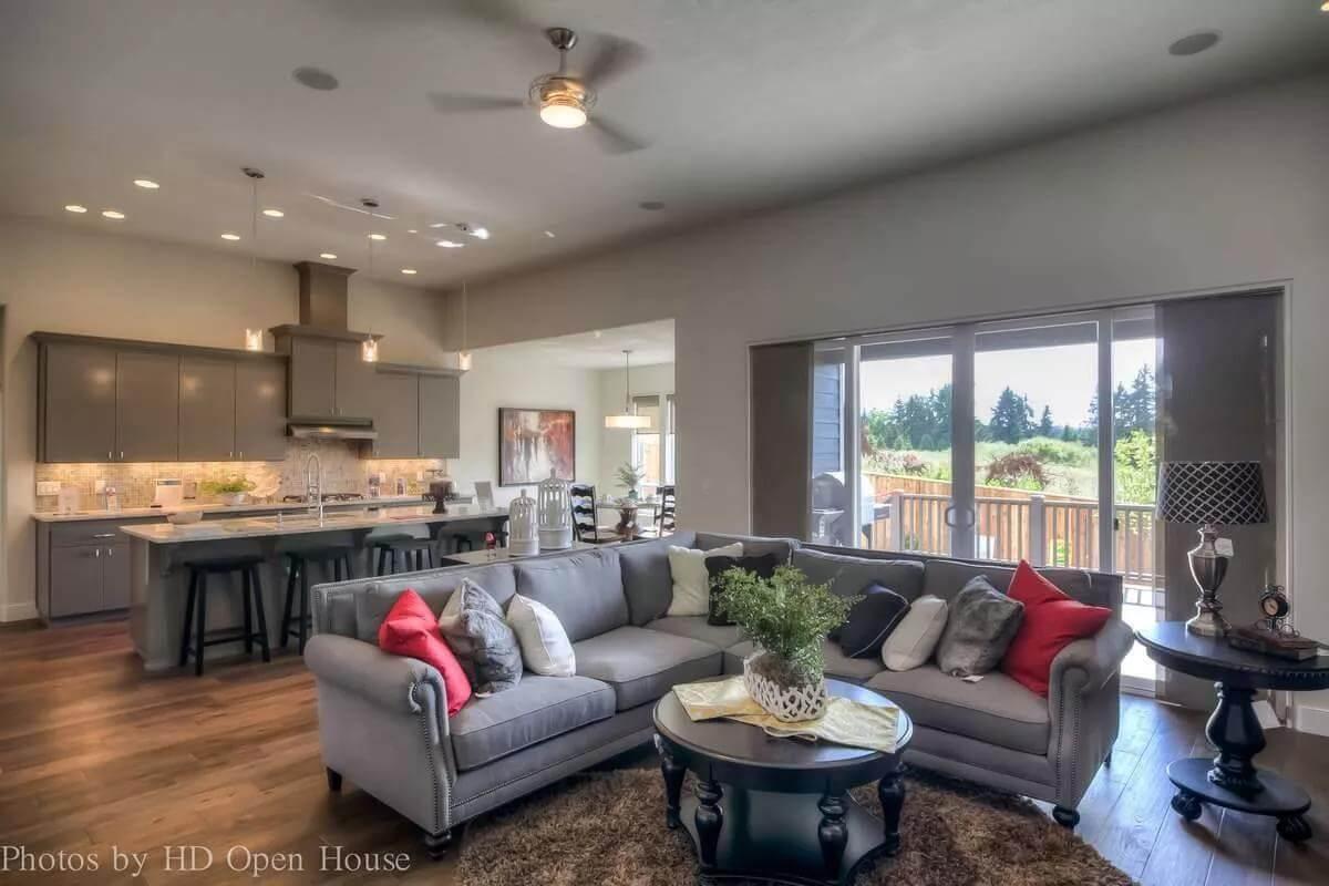 Spacious Open-Plan Living Room with Inviting Views of the Outdoors