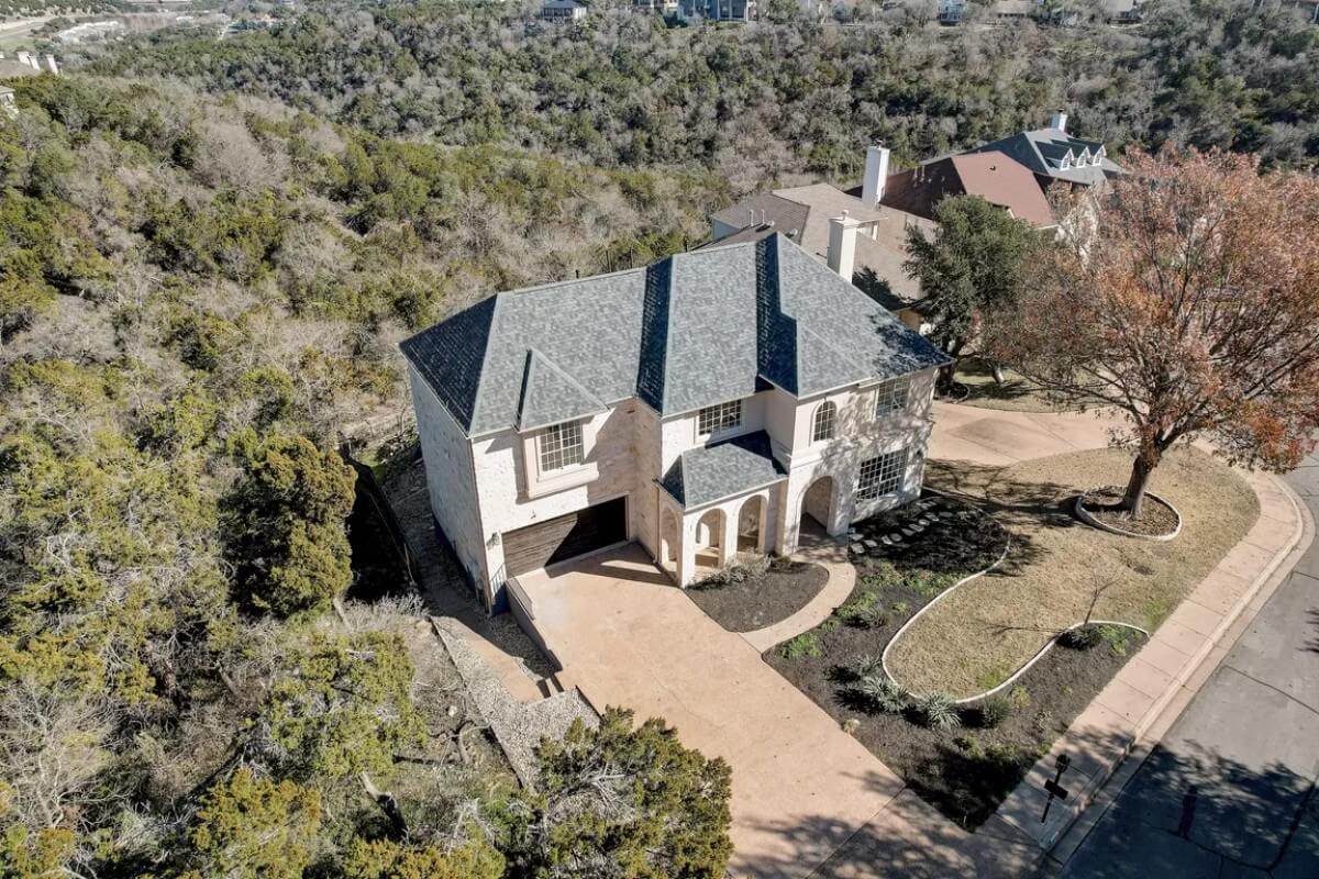 Take in the Elevated Views Around This Stone-Front Home